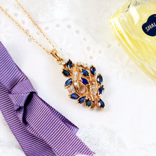 SAPPHIRE-DIAMOND-LEAF-PENDENT-GOLD-CHAIN-ASMMENTRY-